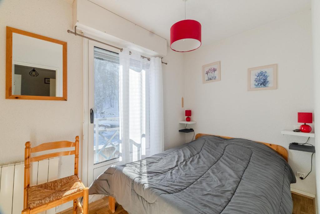 Postel nebo postele na pokoji v ubytování La Baregine