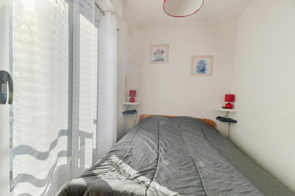Postel nebo postele na pokoji v ubytování La Baregine