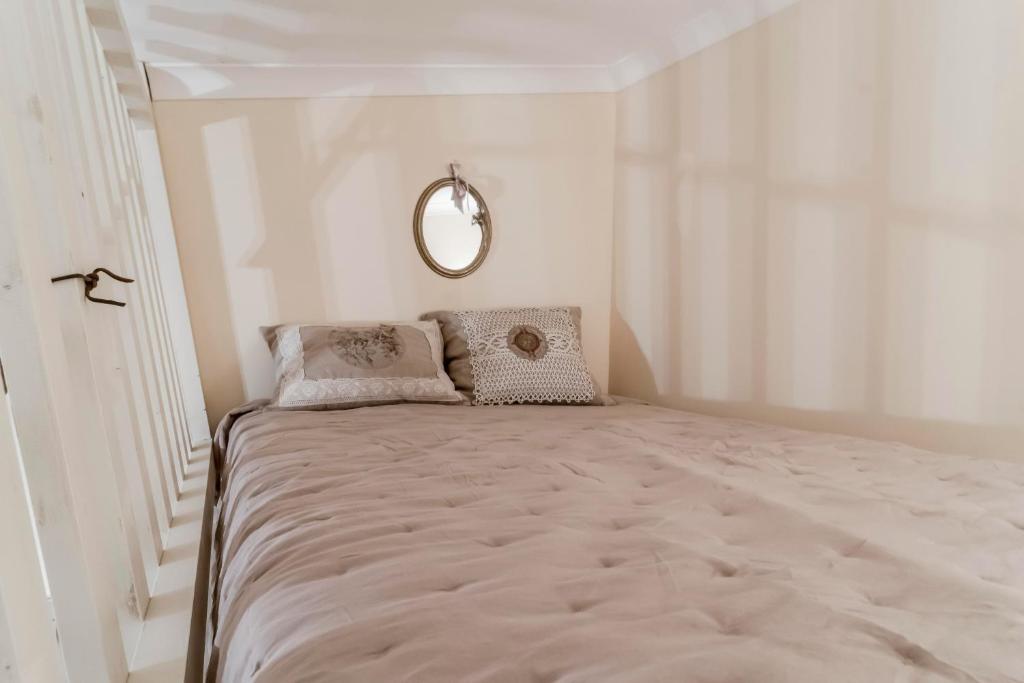 Posteľ alebo postele v izbe v ubytovaní La Petite Maison de Villecroze