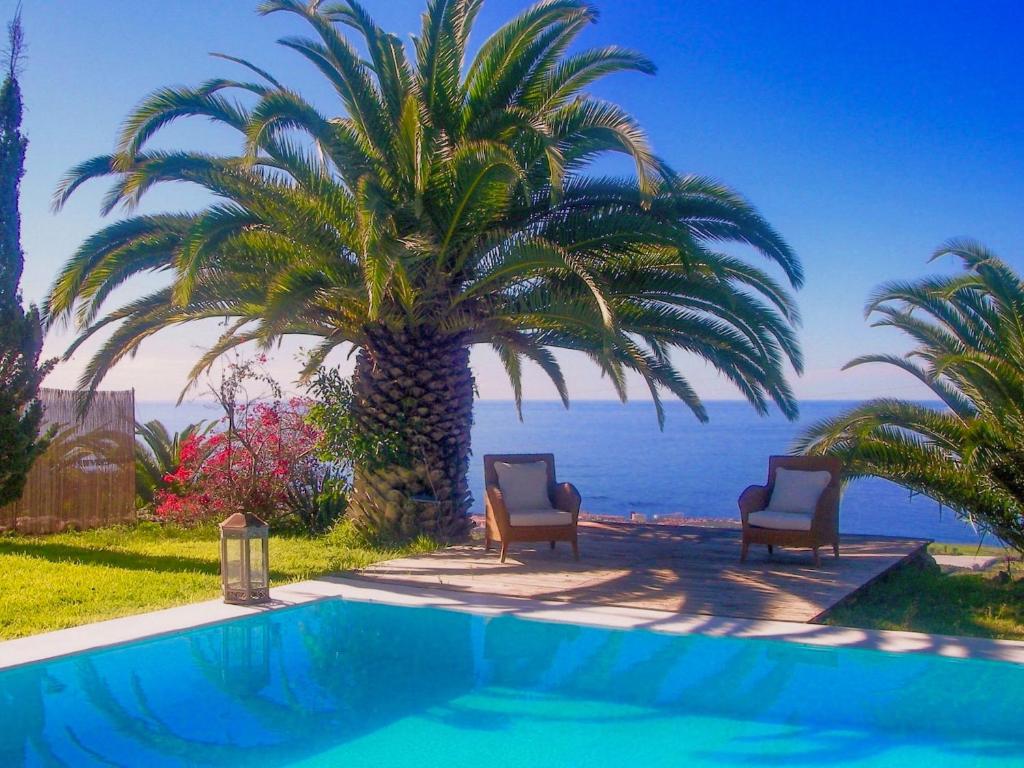 The swimming pool at or close to Detached Villa with Garden, Heated and Private Pool, Sea View, Parking Free