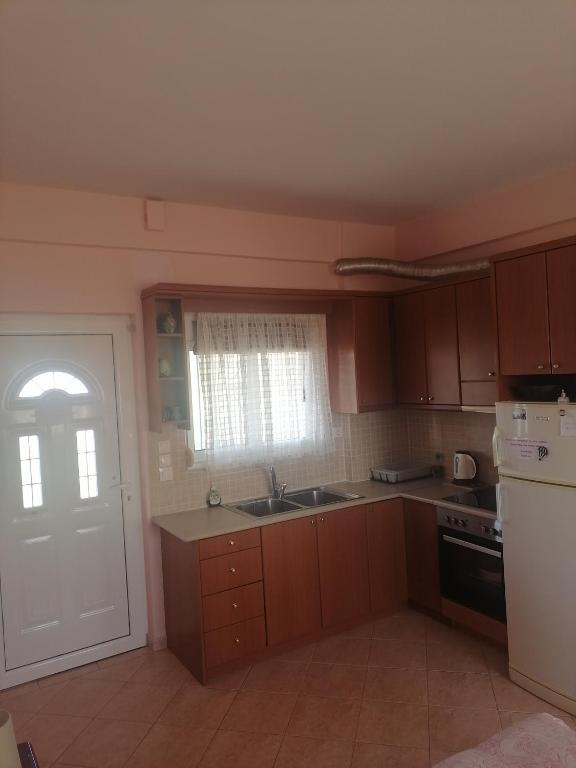Kuchyň nebo kuchyňský kout v ubytování Mina Apartments