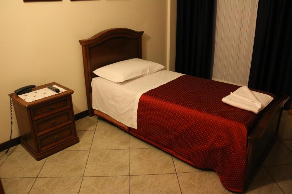Posteľ alebo postele v izbe v ubytovaní Hotel Ristorante Regina