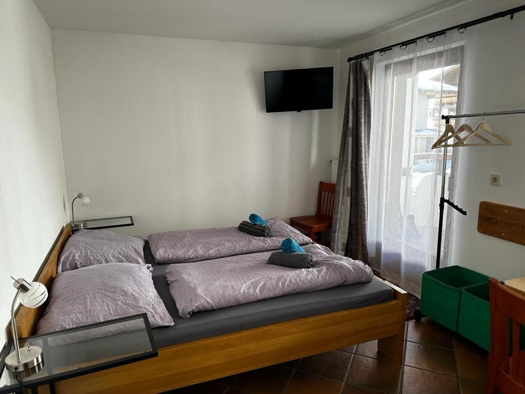 Postel nebo postele na pokoji v ubytování Tuxie Haus