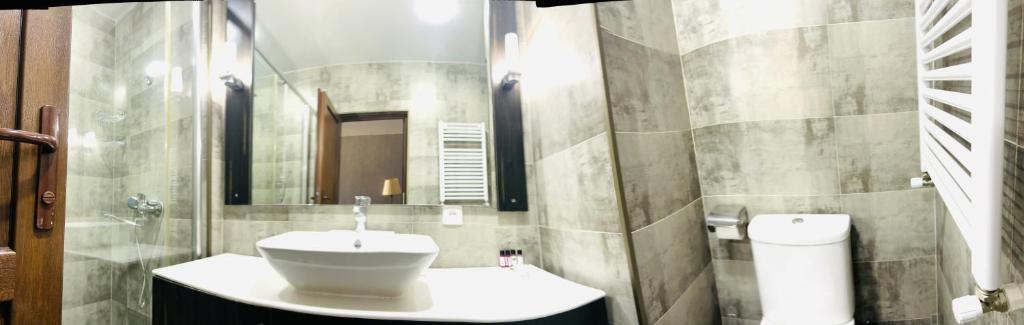 Koupelna v ubytování Green Hotel ANG