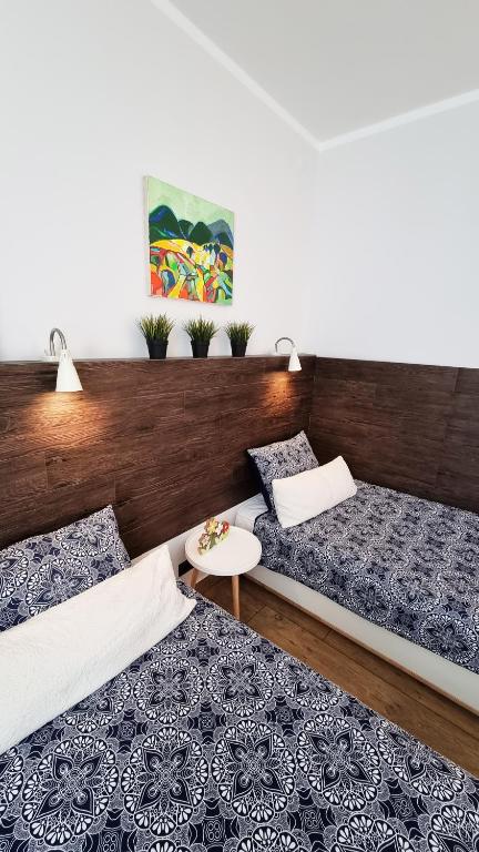 Postel nebo postele na pokoji v ubytování Old Town City Center Apartment