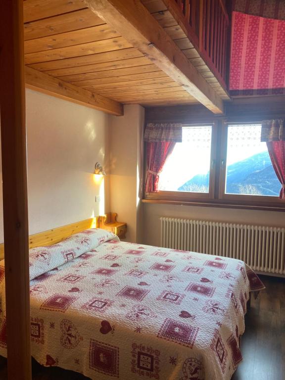 Postel nebo postele na pokoji v ubytování Le Chemin de La Luge