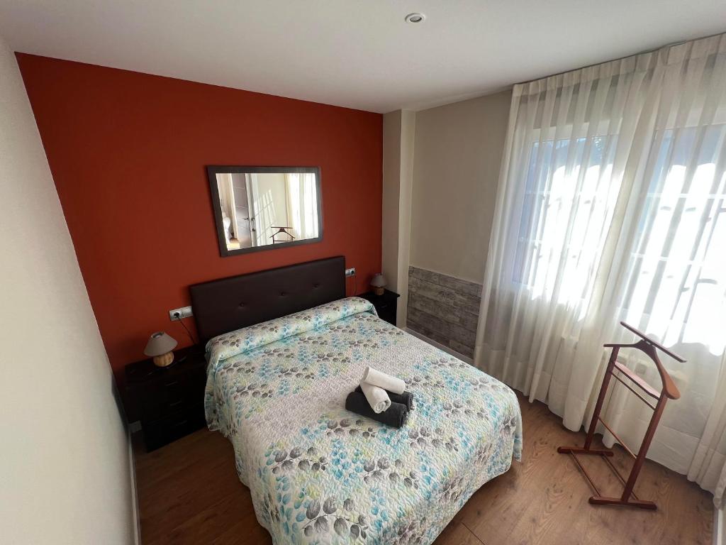 A bed or beds in a room at Complejo la Regalina