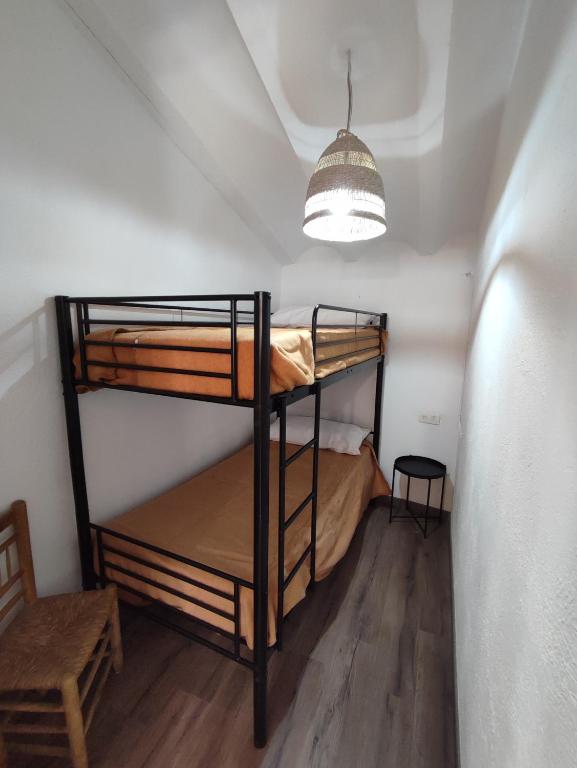 Postel nebo postele na pokoji v ubytování CASA DALMA