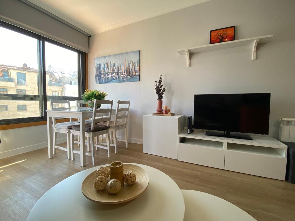 Et tv og/eller underholdning på Ático Rey Daviña Centro y Playa