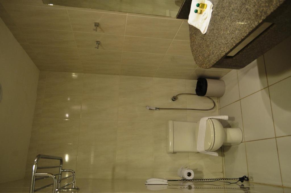 Koupelna v ubytování Hotel Áster