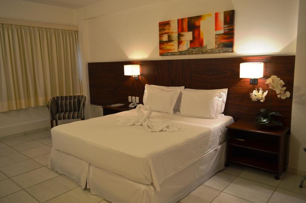 Postel nebo postele na pokoji v ubytování Hotel Áster