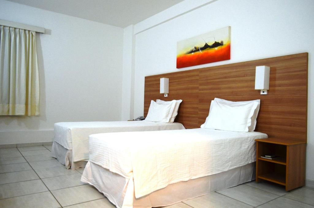 Postel nebo postele na pokoji v ubytování Hotel Áster