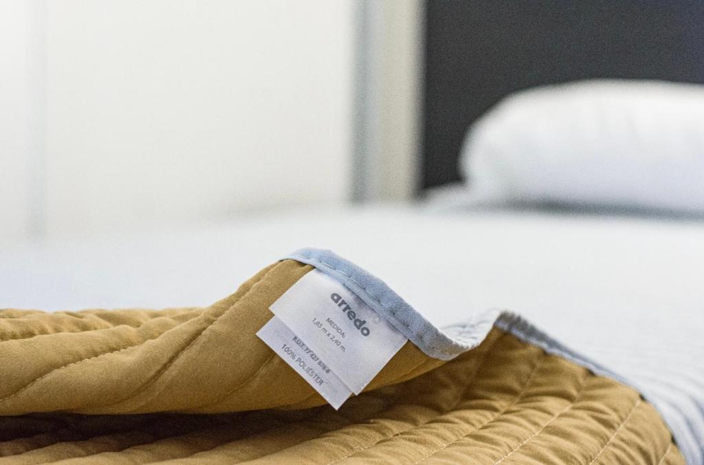 Postel nebo postele na pokoji v ubytování Departamentos Rosina 1