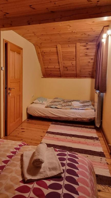 Postel nebo postele na pokoji v ubytování Jankovic Chalet
