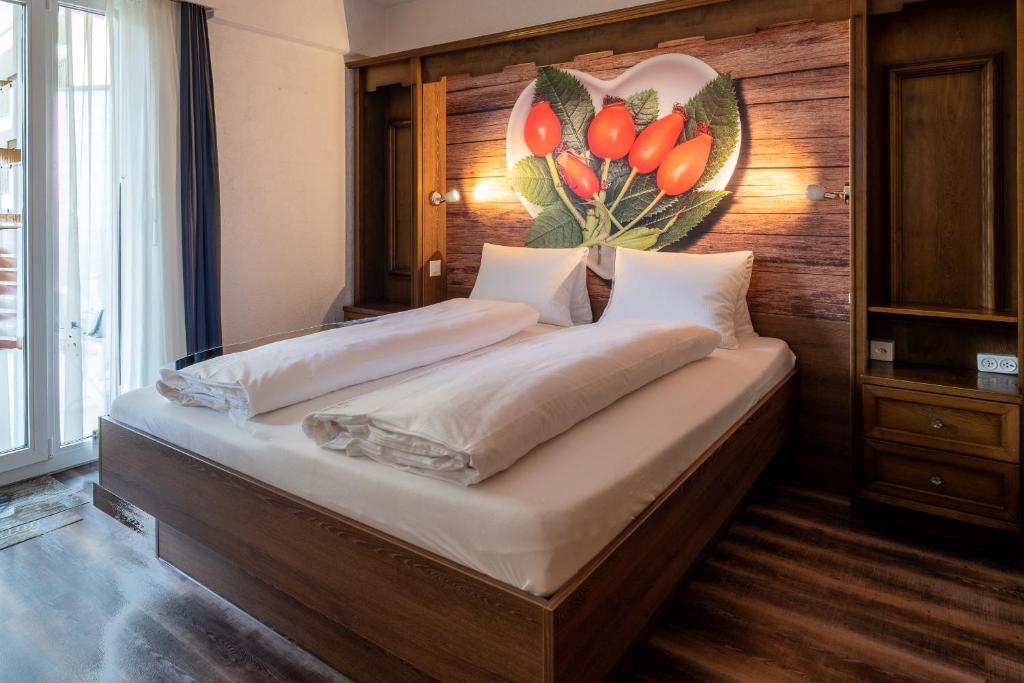 Postel nebo postele na pokoji v ubytování dala Hotel & Apartments