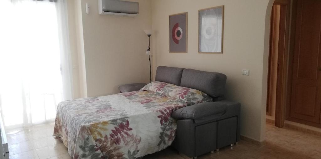 Postel nebo postele na pokoji v ubytování Apto ISA: amplio y acogedor apto de 75m con terraza, aire acondicionado y parking gratuito