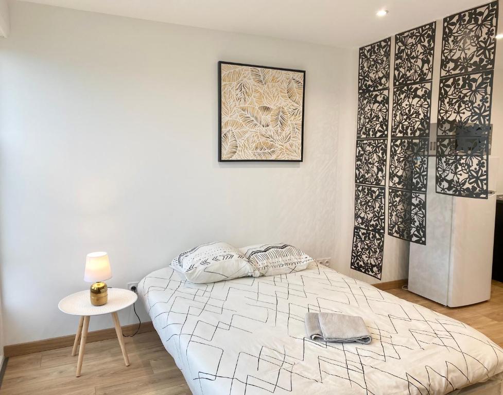 Posteľ alebo postele v izbe v ubytovaní L Evasion - Appartement Plage - TV HD - WIFI FIBRE