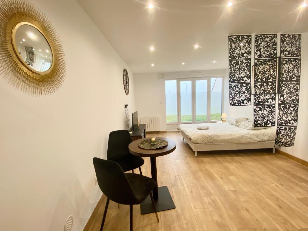 Posteľ alebo postele v izbe v ubytovaní L Evasion - Appartement Plage - TV HD - WIFI FIBRE