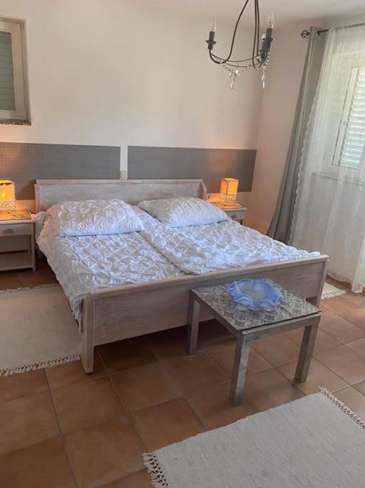 Postel nebo postele na pokoji v ubytování Casa Fumica Apartment