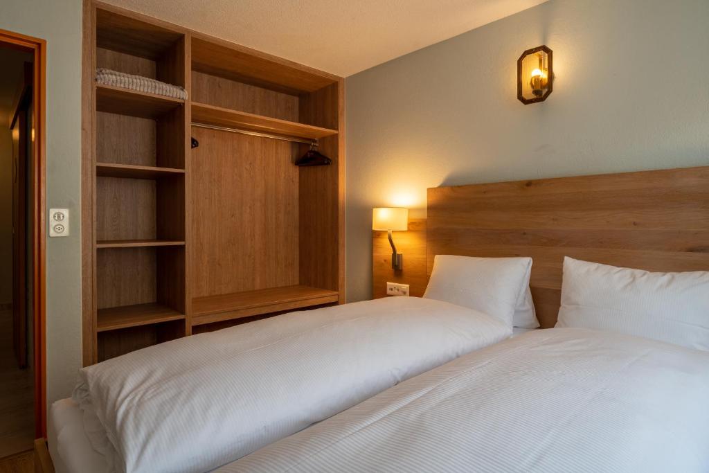 Postel nebo postele na pokoji v ubytování dala Hotel & Apartments