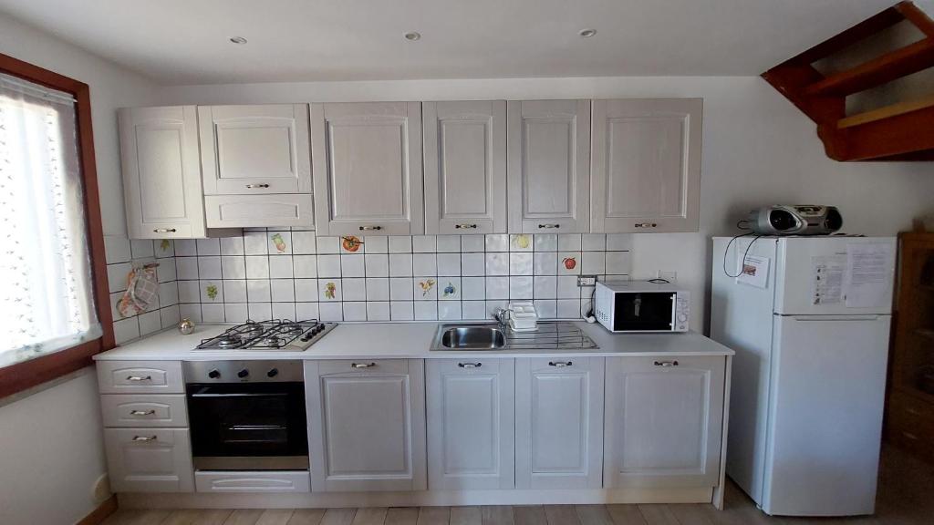A kitchen or kitchenette at Casa Sant'Anna