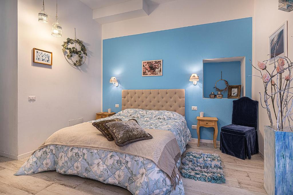 Posteľ alebo postele v izbe v ubytovaní White & Gold Suite Verona