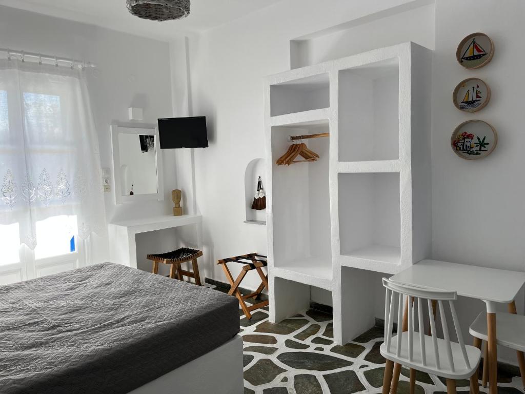Posteľ alebo postele v izbe v ubytovaní Angie's Studios