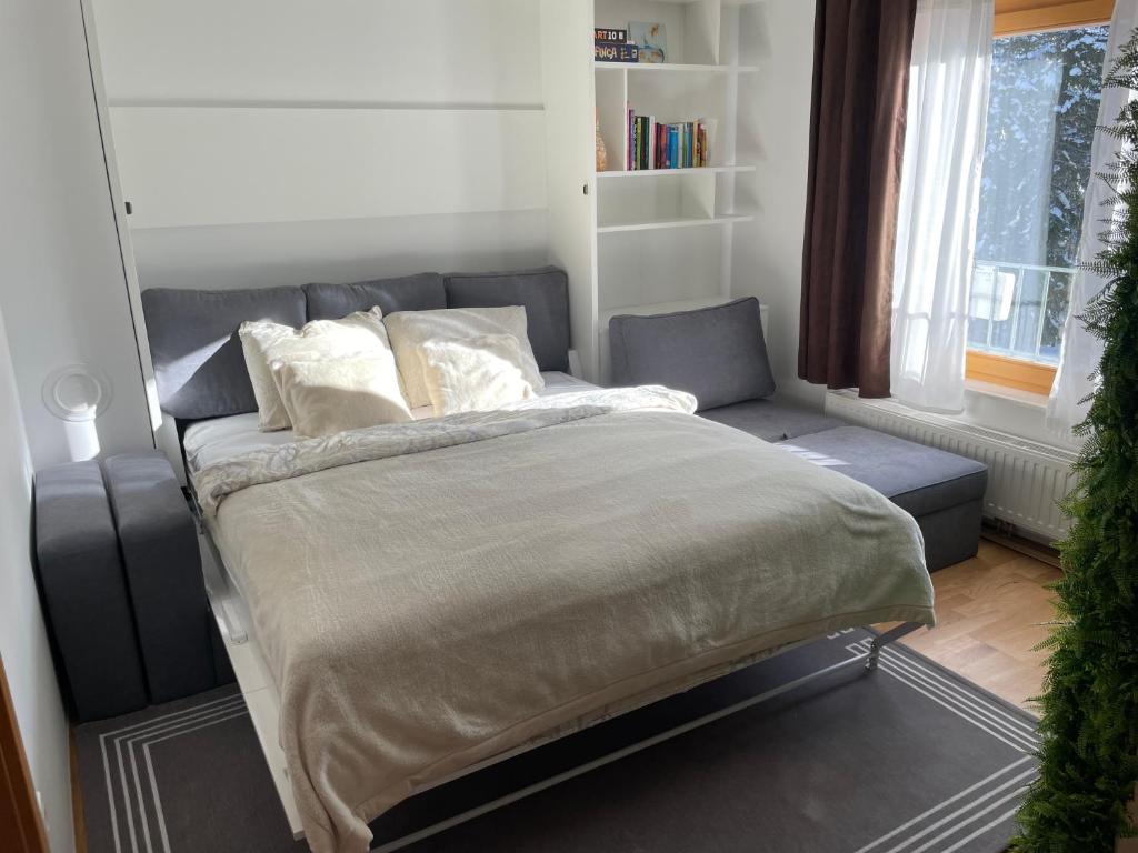 Postel nebo postele na pokoji v ubytování Apartma Pohorske terase Brumen Mariborsko Pohorje