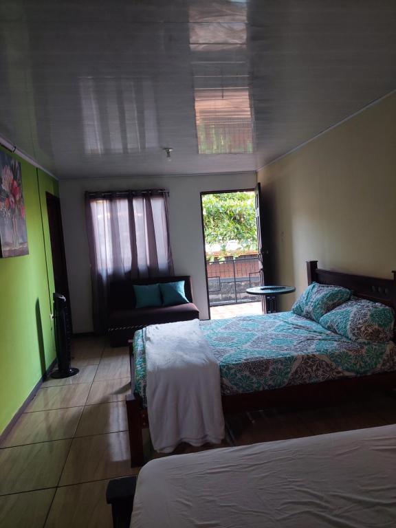 Postel nebo postele na pokoji v ubytování Anchia - Hostel