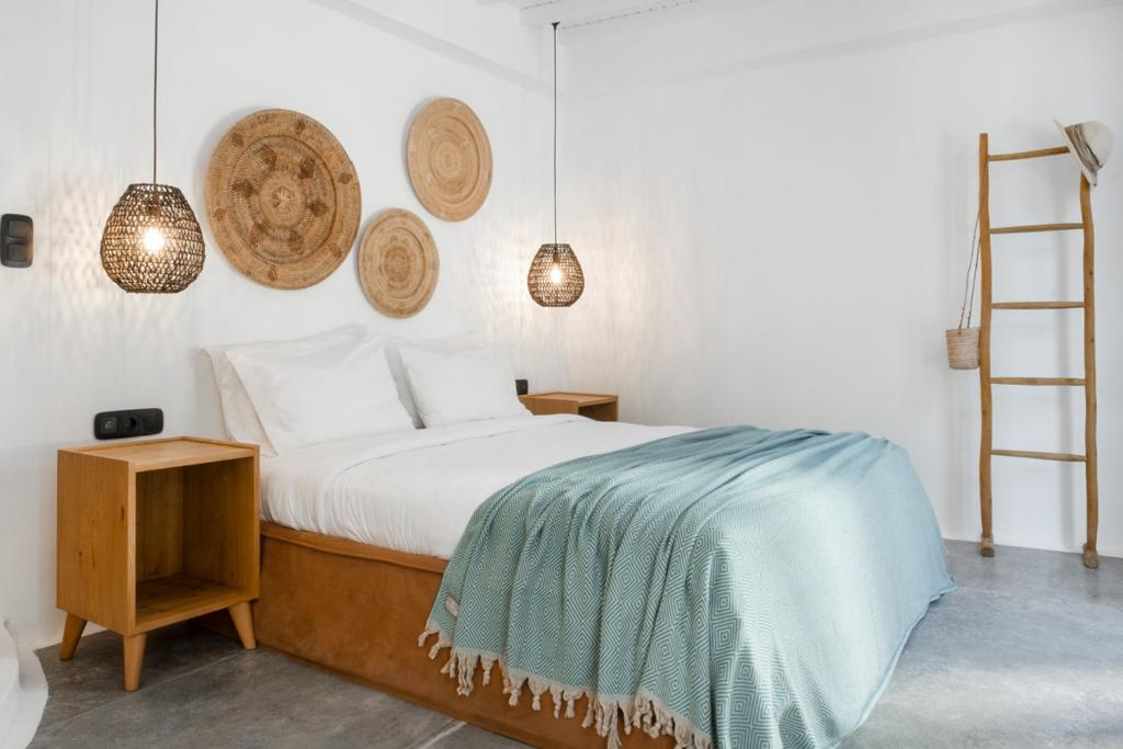 Posteľ alebo postele v izbe v ubytovaní InTown Mykonos- Two Bedrooms Duplex House