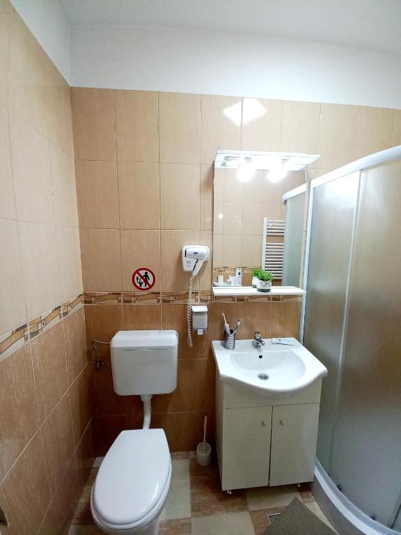 Koupelna v ubytování Casa Alex