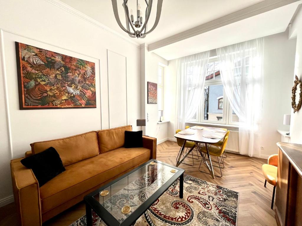Posezení v ubytování Agapella Apartamenty- Apartament Fiszera 350m from the beach, free parking