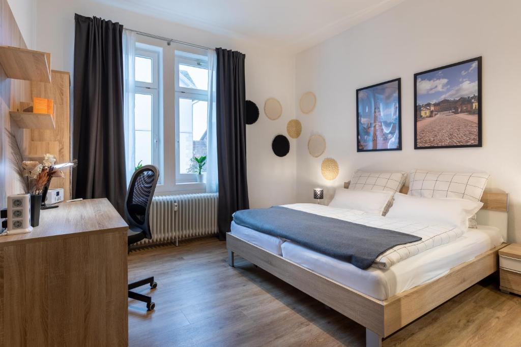 Postel nebo postele na pokoji v ubytování Apartment 54 - Ferienwohnung Bad Arolsen