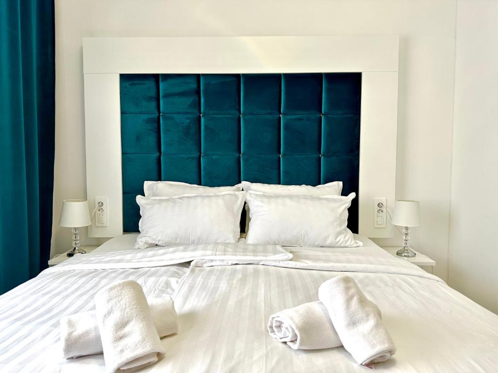 Ein Bett oder Betten in einem Zimmer der Unterkunft Bed & Breakfast Donji Grad