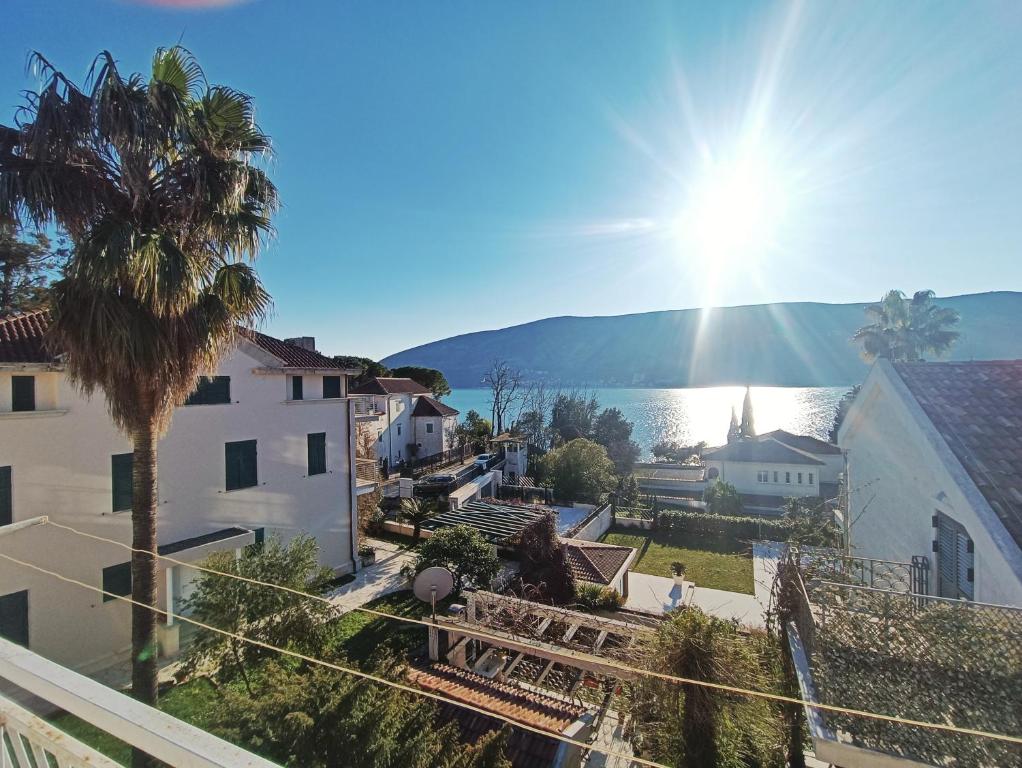 a view of the ocean from a house at The Golden Hour in Herceg-Novi