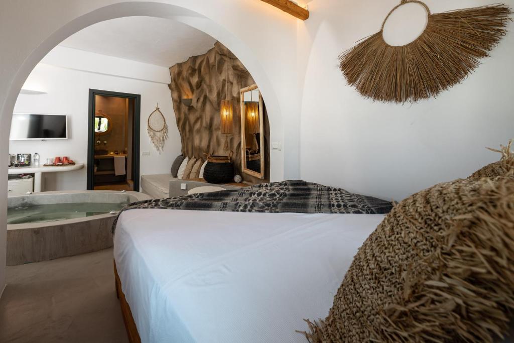 Postel nebo postele na pokoji v ubytování Sandaya Luxury Suites