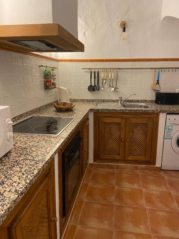 Kuchyň nebo kuchyňský kout v ubytování Acogedora Casa Rural en Olvera La Morada