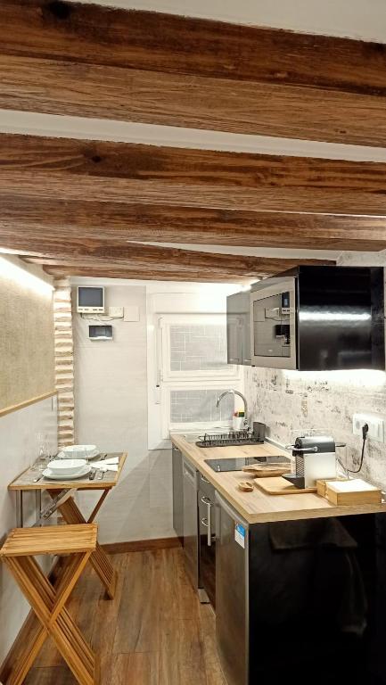 Kuchyňa alebo kuchynka v ubytovaní Apartamento Suite para dos