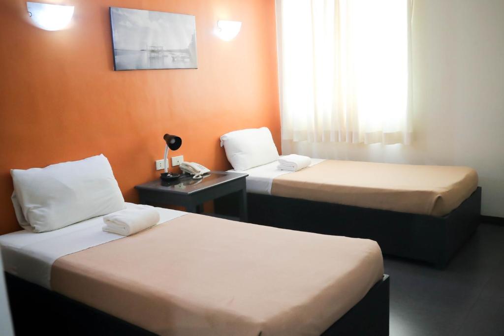 Postel nebo postele na pokoji v ubytování Ialodge