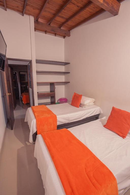 Postel nebo postele na pokoji v ubytování Hotel Palma De Sevilla