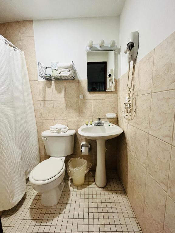 Koupelna v ubytování SJ SUITES HOTEL