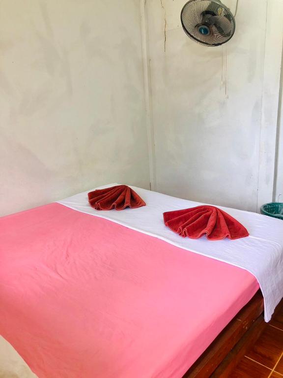 Postel nebo postele na pokoji v ubytování JR GYM & Resort