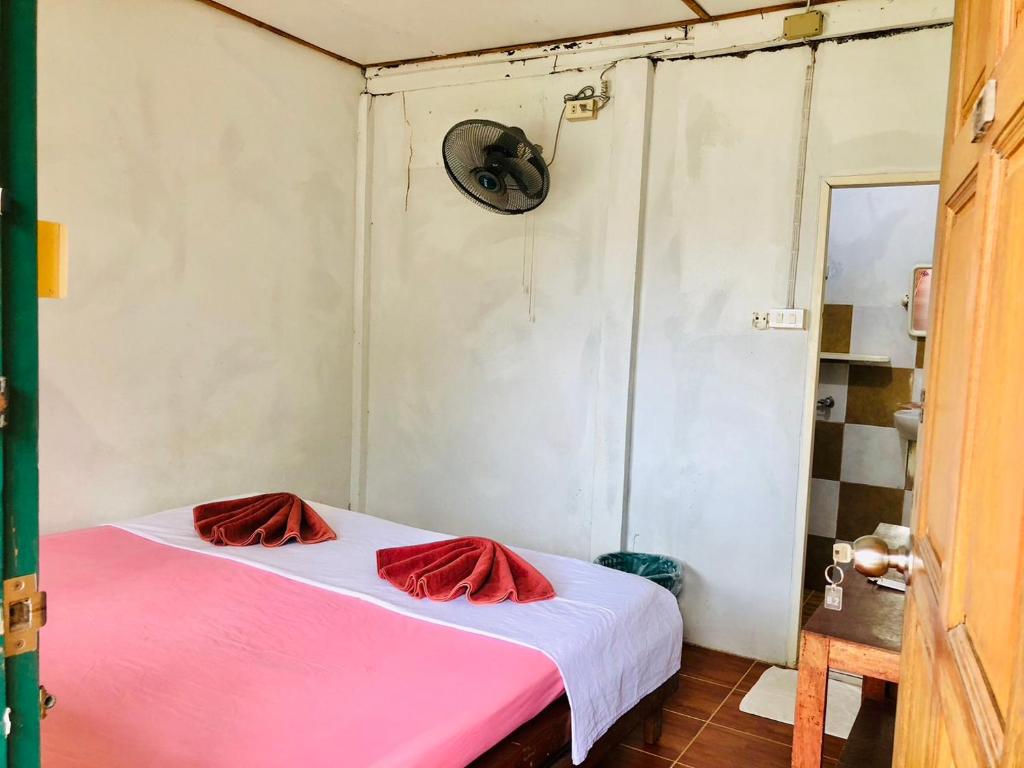 Postel nebo postele na pokoji v ubytování JR GYM & Resort
