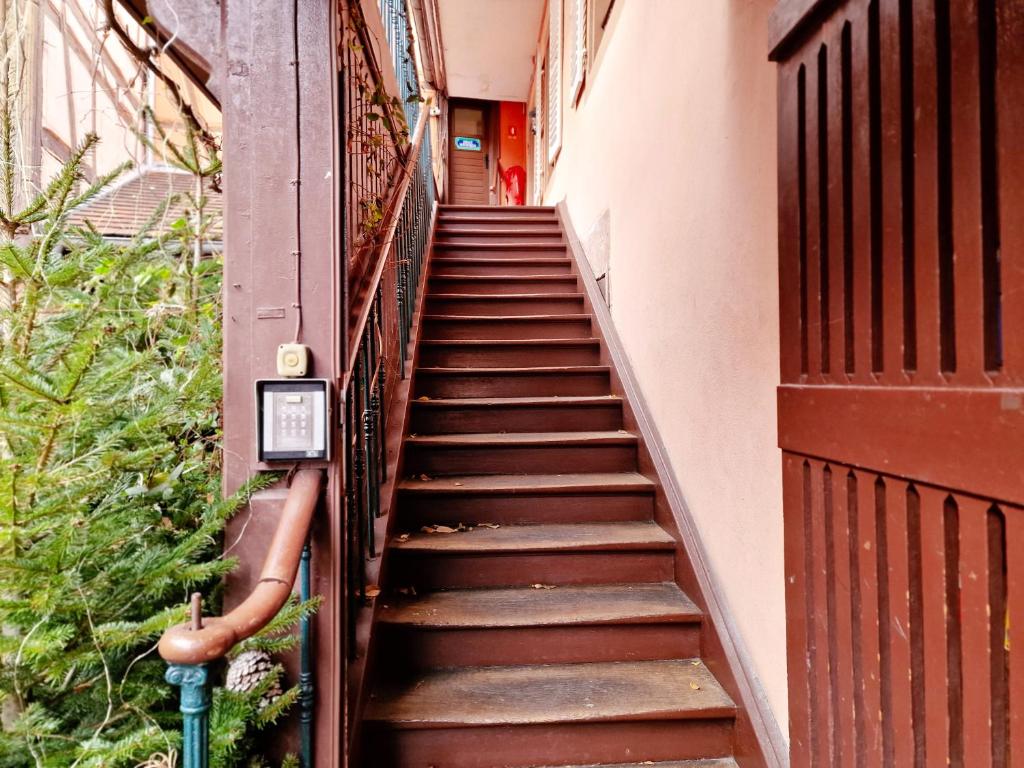 a set of stairs leading up to a building at Chambres d&#39;hôtes Chez Caroline in Colmar