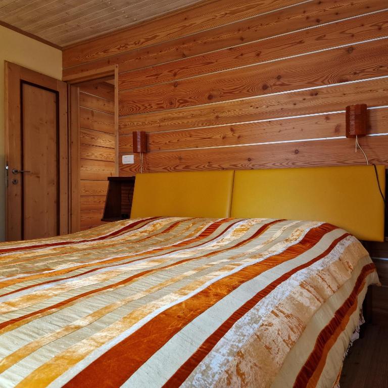 Postel nebo postele na pokoji v ubytování Chalet Yvonne