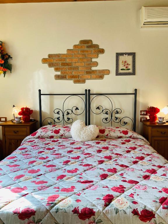 Postel nebo postele na pokoji v ubytování Agriturismo Le Tese