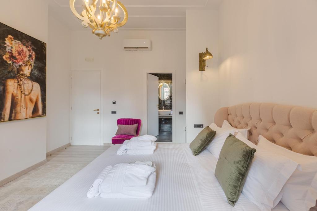 Postel nebo postele na pokoji v ubytování Residenza di Fedralia