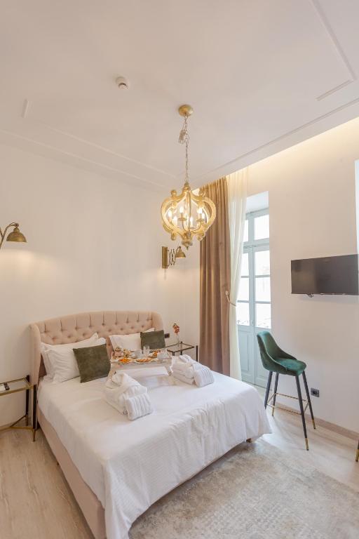Postel nebo postele na pokoji v ubytování Residenza di Fedralia