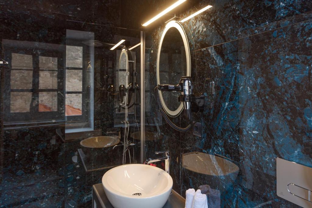 Koupelna v ubytování Residenza di Fedralia