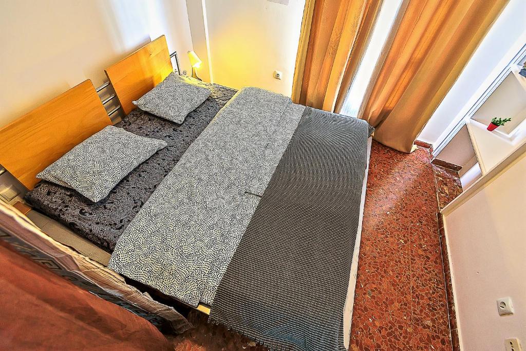 Postel nebo postele na pokoji v ubytování Misericordia Central 4-Bedroom Apartment with Lift